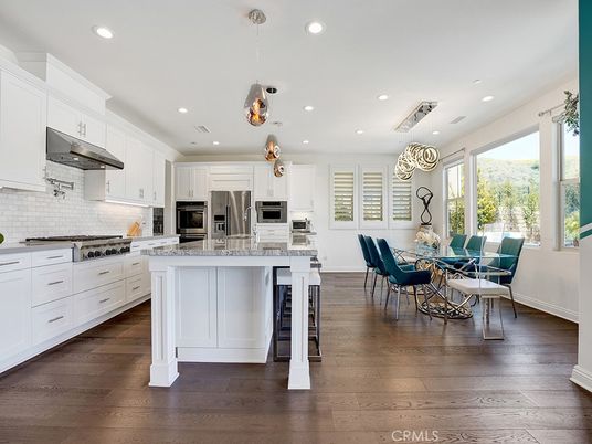 Dining room, Interior, Kitchen, Pendant Lights, Recessed Lighting, Stainless Steel Appliances, Wood Texture Flooring