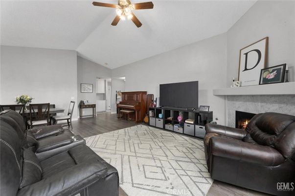 Dining room, Fireplace, Interior, Living room, Piano, Wood Texture Flooring