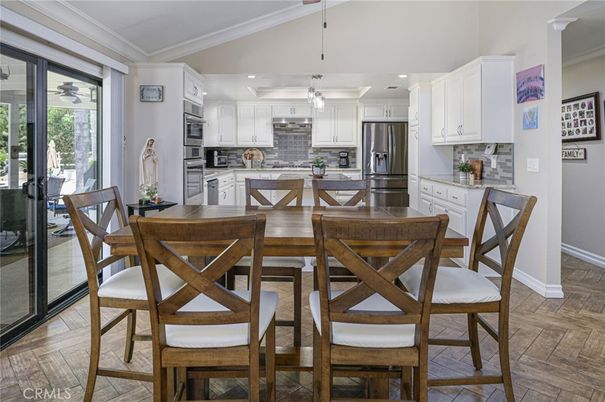 Dining room, Interior, Kitchen, Recessed Lighting, Stainless Steel Appliances, Wood Texture Flooring