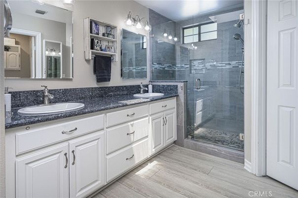 Bathroom, Dual Sink Vanities, Glass Shower, Interior, Wood Texture Flooring