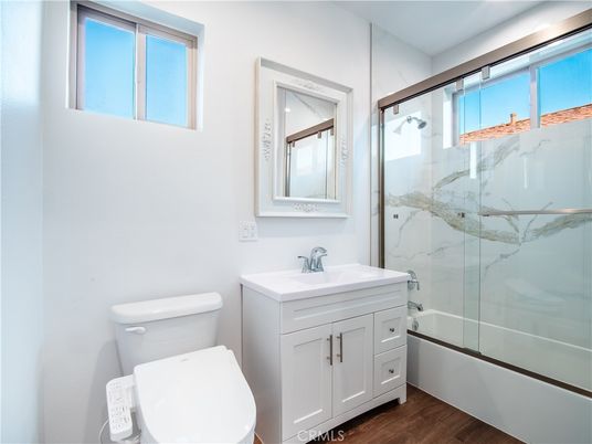 Bathroom, Glass Shower, Interior, Marble Walls, Wood Texture Flooring