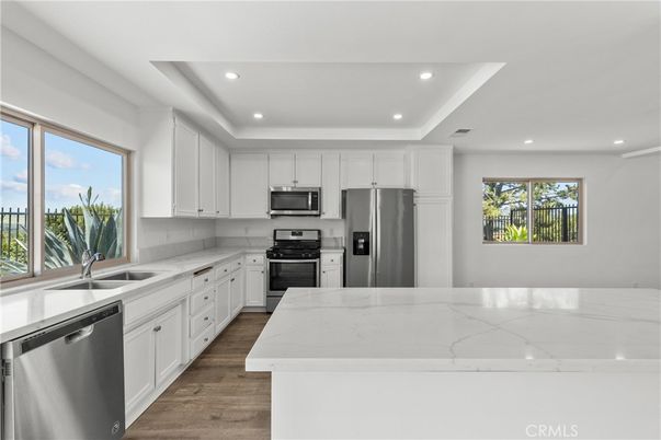 Interior, Kitchen, Recessed Lighting, Stainless Steel Appliances, Wood Texture Flooring