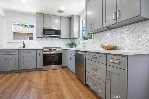 Interior, Kitchen, Recessed Lighting, Stainless Steel Appliances, Wood Texture Flooring