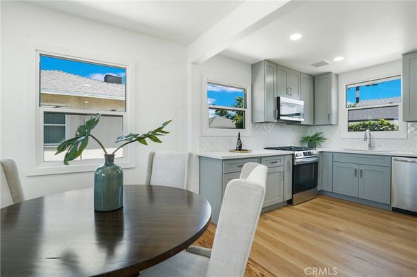 Dining room, Interior, Kitchen, Recessed Lighting, Stainless Steel Appliances, Wood Texture Flooring