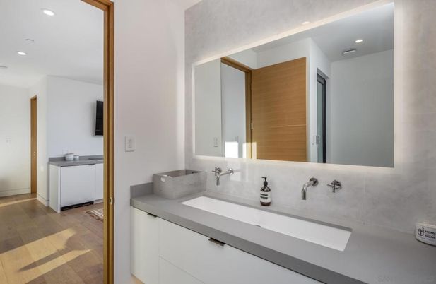 Bathroom, Dual Sink Vanities, Interior, Recessed Lighting, Wood Texture Flooring
