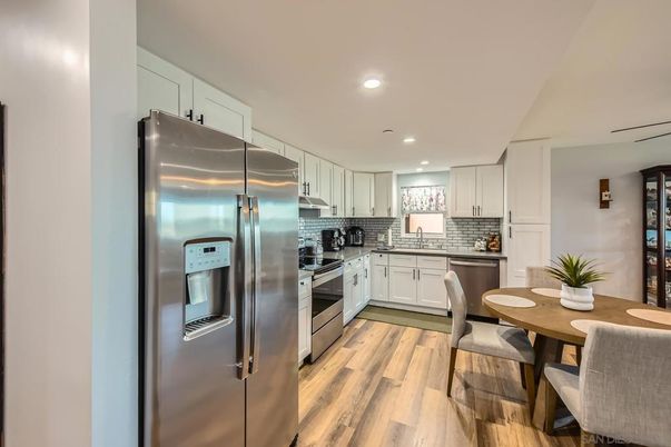 Dining room, Interior, Kitchen, Recessed Lighting, Stainless Steel Appliances, Wood Texture Flooring