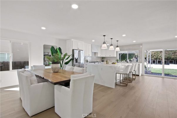 Dining room, Interior, Kitchen, Pendant Lights, Recessed Lighting, Stainless Steel Appliances, Wood Texture Flooring