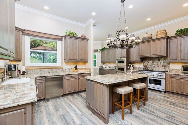 Chandelier, Interior, Kitchen, Recessed Lighting, Stainless Steel Appliances, Wood Texture Flooring