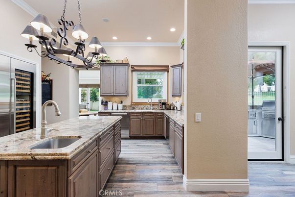 Chandelier, Interior, Kitchen, Recessed Lighting, Stainless Steel Appliances, Wood Texture Flooring