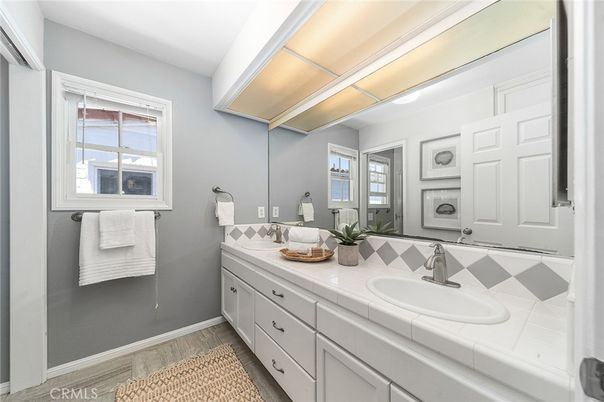 Bathroom, Dual Sink Vanities, Interior, Tile Countertops, Wood Texture Flooring