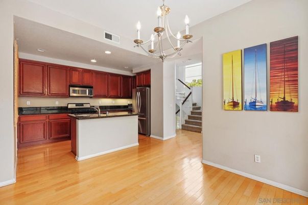 Chandelier, Interior, Kitchen, Recessed Lighting, Stainless Steel Appliances, Wood Texture Flooring