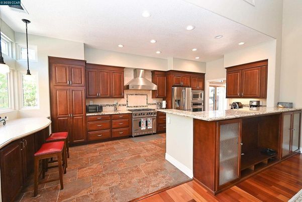 Interior, Kitchen, Pendant Lights, Recessed Lighting, Stainless Steel Appliances, Wood Texture Flooring