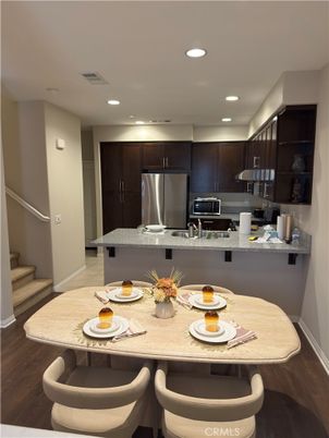 Dining room, Interior, Kitchen, Recessed Lighting, Stainless Steel Appliances, Wood Texture Flooring