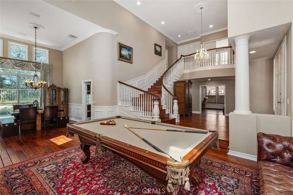 Billiard Table, Chandelier, Dining room, Game Room, Interior, Pendant Lights, Recessed Lighting, Wood Texture Flooring
