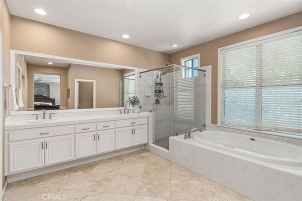 Bathroom, Dual Sink Vanities, Glass Shower, Interior, Recessed Lighting, Tile Countertops
