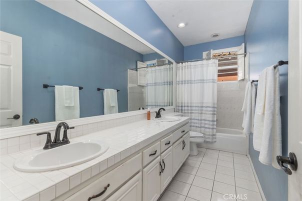 Bathroom, Dual Sink Vanities, Interior, Recessed Lighting, Tile Countertops