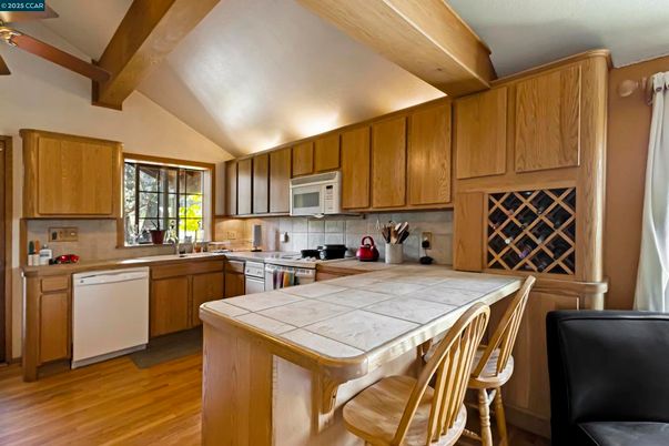 Interior, Kitchen, Tile Countertops, Wooden Beams, Wood Texture Flooring
