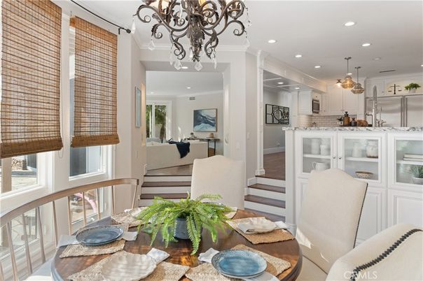 Dining room, Interior, Kitchen, Living room, Pendant Lights, Recessed Lighting, Stainless Steel Appliances, Wood Texture Flooring