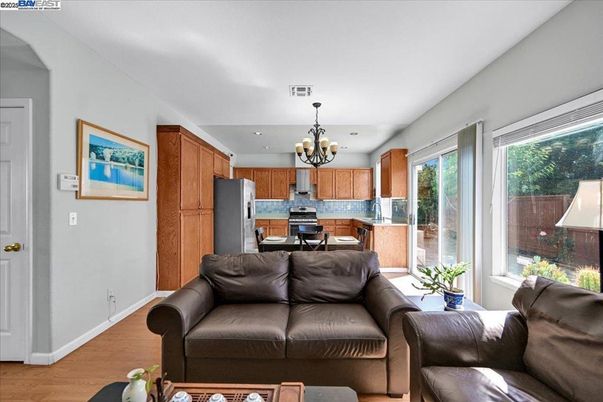 Chandelier, Dining room, Interior, Kitchen, Living room, Recessed Lighting, Wood Texture Flooring