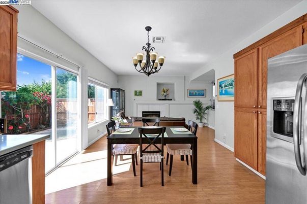Chandelier, Dining room, Fireplace, Interior, Kitchen, Wood Texture Flooring