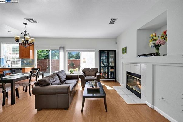 Chandelier, Dining room, Fireplace, Interior, Living room, Wood Texture Flooring