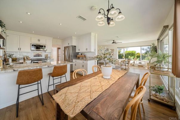 Dining room, Interior, Kitchen, Living room, Recessed Lighting, Stainless Steel Appliances, Wood Texture Flooring