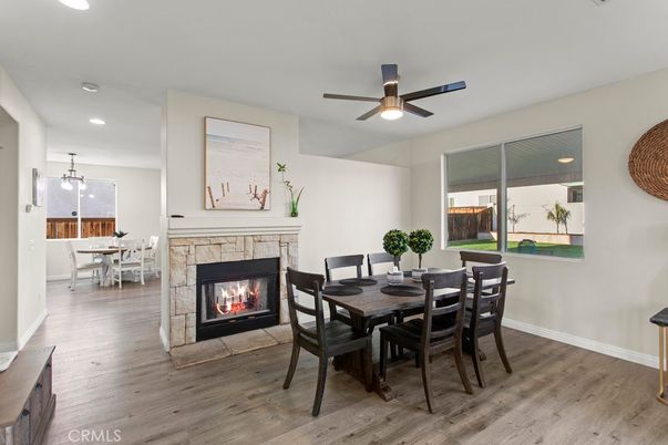 Dining room, Fireplace, Interior, Pendant Lights, Recessed Lighting, Wood Texture Flooring