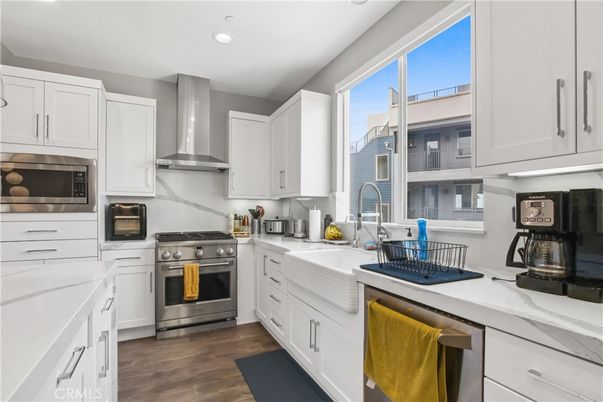 Interior, Kitchen, Recessed Lighting, Stainless Steel Appliances, Wood Texture Flooring