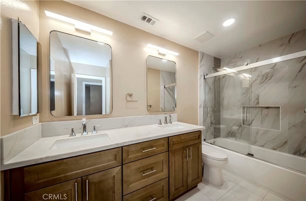 Bathroom, Dual Sink Vanities, Glass Shower, Interior, Marble Walls, Recessed Lighting