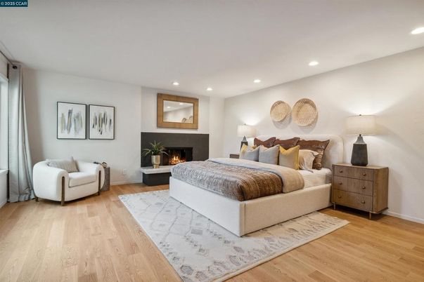 Bedroom, Fireplace, Interior, Recessed Lighting, Wood Texture Flooring
