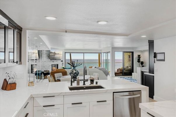 Fireplace, Interior, Kitchen, Living room, Recessed Lighting, Stainless Steel Appliances, Water