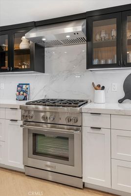 Interior, Kitchen, Marble Walls, Stainless Steel Appliances, Wood Texture Flooring