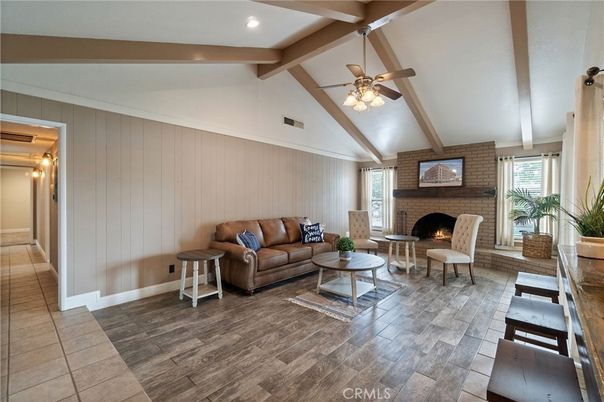 Fireplace, Interior, Living room, Recessed Lighting, Stone Walls, Wood Texture Flooring