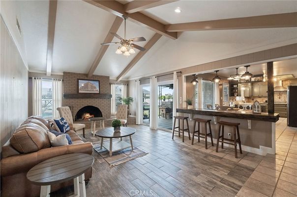 Fireplace, Interior, Living room, Pendant Lights, Recessed Lighting, Stone Walls, Wood Texture Flooring