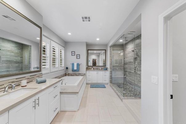 Bathroom, Dual Sink Vanities, Glass Shower, Interior, Recessed Lighting, Wood Texture Flooring