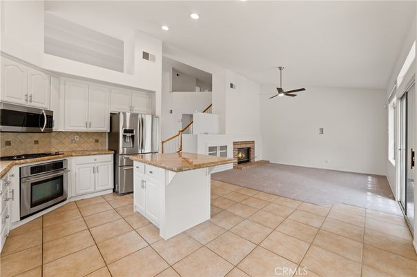 Fireplace, Interior, Kitchen, Recessed Lighting, Stainless Steel Appliances
