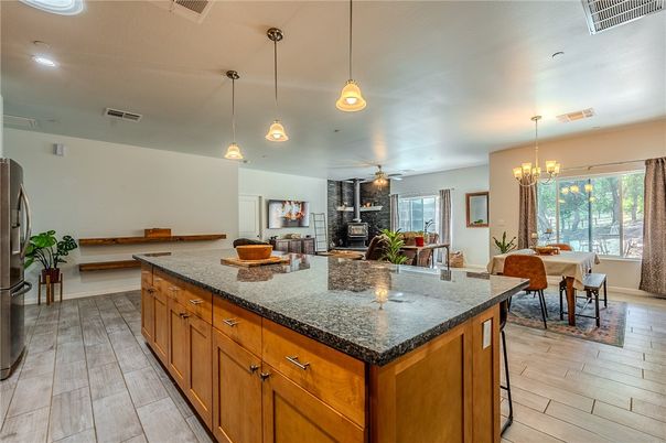 Chandelier, Dining room, Fireplace, Interior, Kitchen, Pendant Lights, Recessed Lighting, Wood Texture Flooring