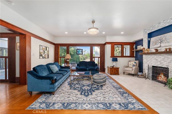 Chandelier, Fireplace, Interior, Living room, Recessed Lighting, Wood Texture Flooring