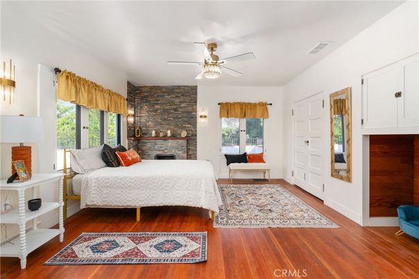 Bedroom, Fireplace, Interior, Living room, Stone Walls, Wood Texture Flooring
