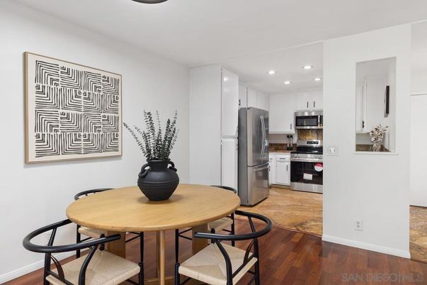 Dining room, Interior, Kitchen, Recessed Lighting, Stainless Steel Appliances, Wood Texture Flooring