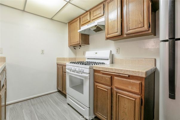 Interior, Kitchen, Tile Countertops, Wood Texture Flooring