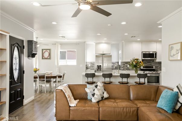 Dining room, Interior, Kitchen, Living room, Recessed Lighting, Stainless Steel Appliances, Wood Texture Flooring