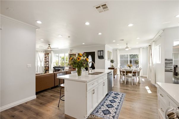 Dining room, Interior, Kitchen, Recessed Lighting, Stainless Steel Appliances, Wood Texture Flooring
