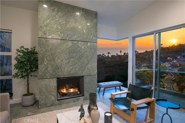 Fireplace, Interior, Marble Walls, Recessed Lighting, Water
