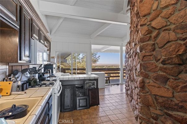 Interior, Kitchen, Stone Walls, Tile Countertops, Water
