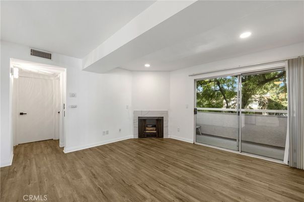 Empty room, Fireplace, Interior, Recessed Lighting, Wood Texture Flooring