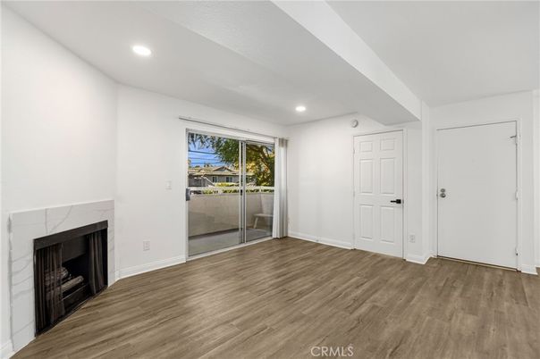 Empty room, Fireplace, Interior, Recessed Lighting, Wood Texture Flooring