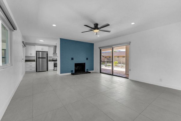 Empty room, Fireplace, Interior, Kitchen, Recessed Lighting, Stainless Steel Appliances