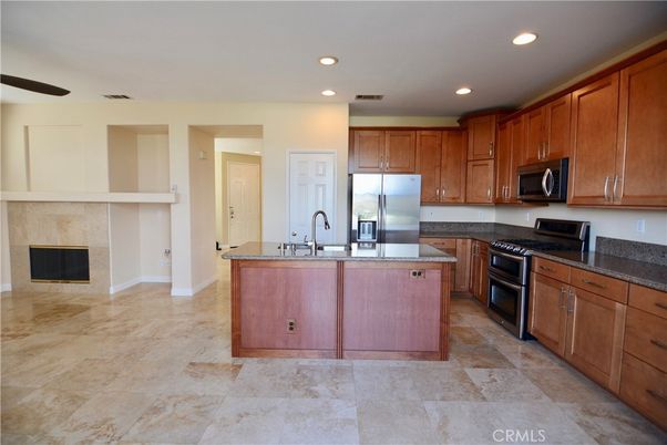 Fireplace, Interior, Kitchen, Recessed Lighting, Stainless Steel Appliances