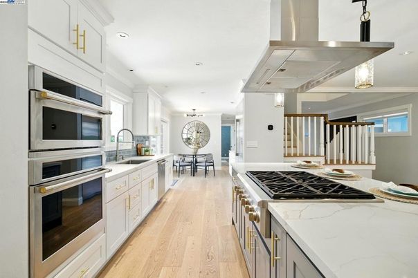 Dining room, Interior, Kitchen, Recessed Lighting, Stainless Steel Appliances, Wood Texture Flooring